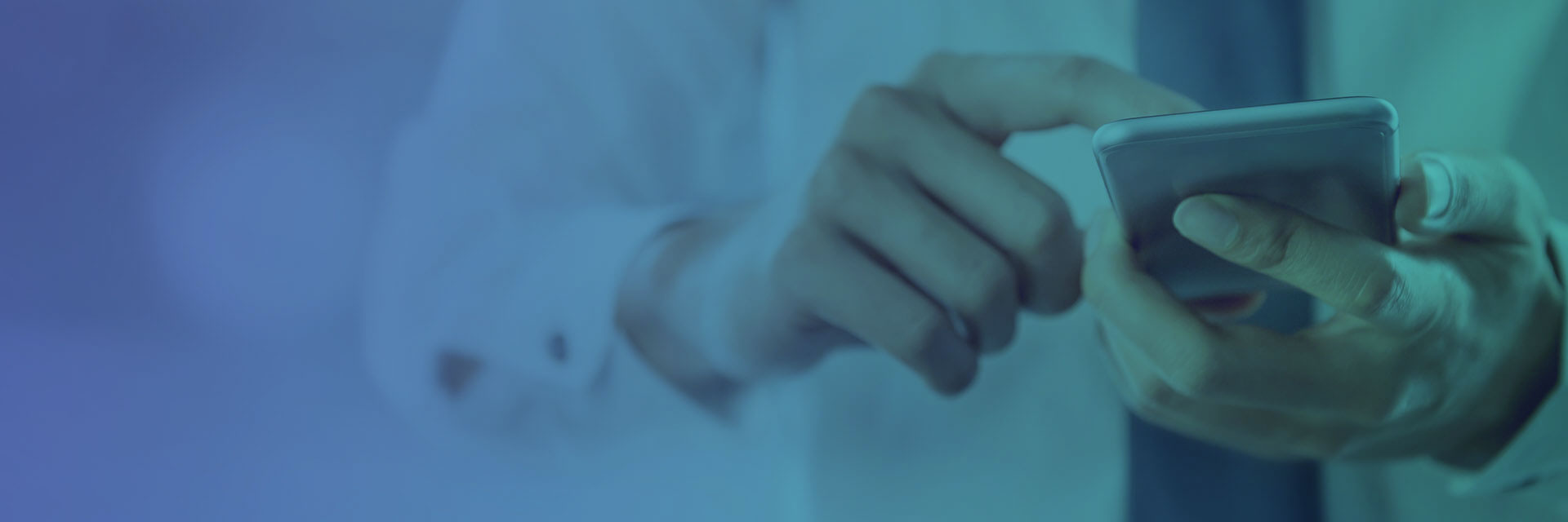 Person touching smartphone screen with a blue gradient background. Visible fingers and device detail